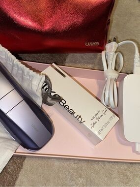 Ulike Purple Personal Hair Removal Device with Red Carrying Pouch